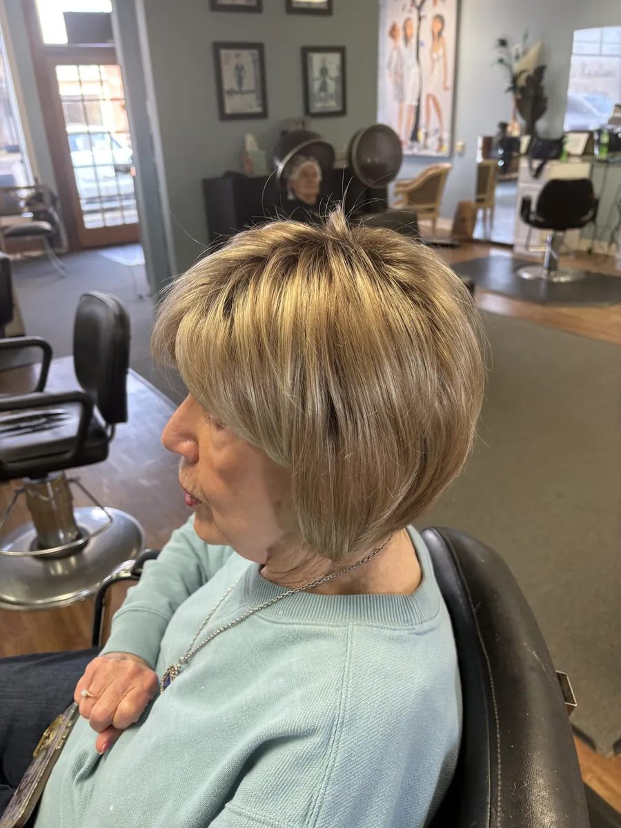 Layered blonde bob haircut, side profile