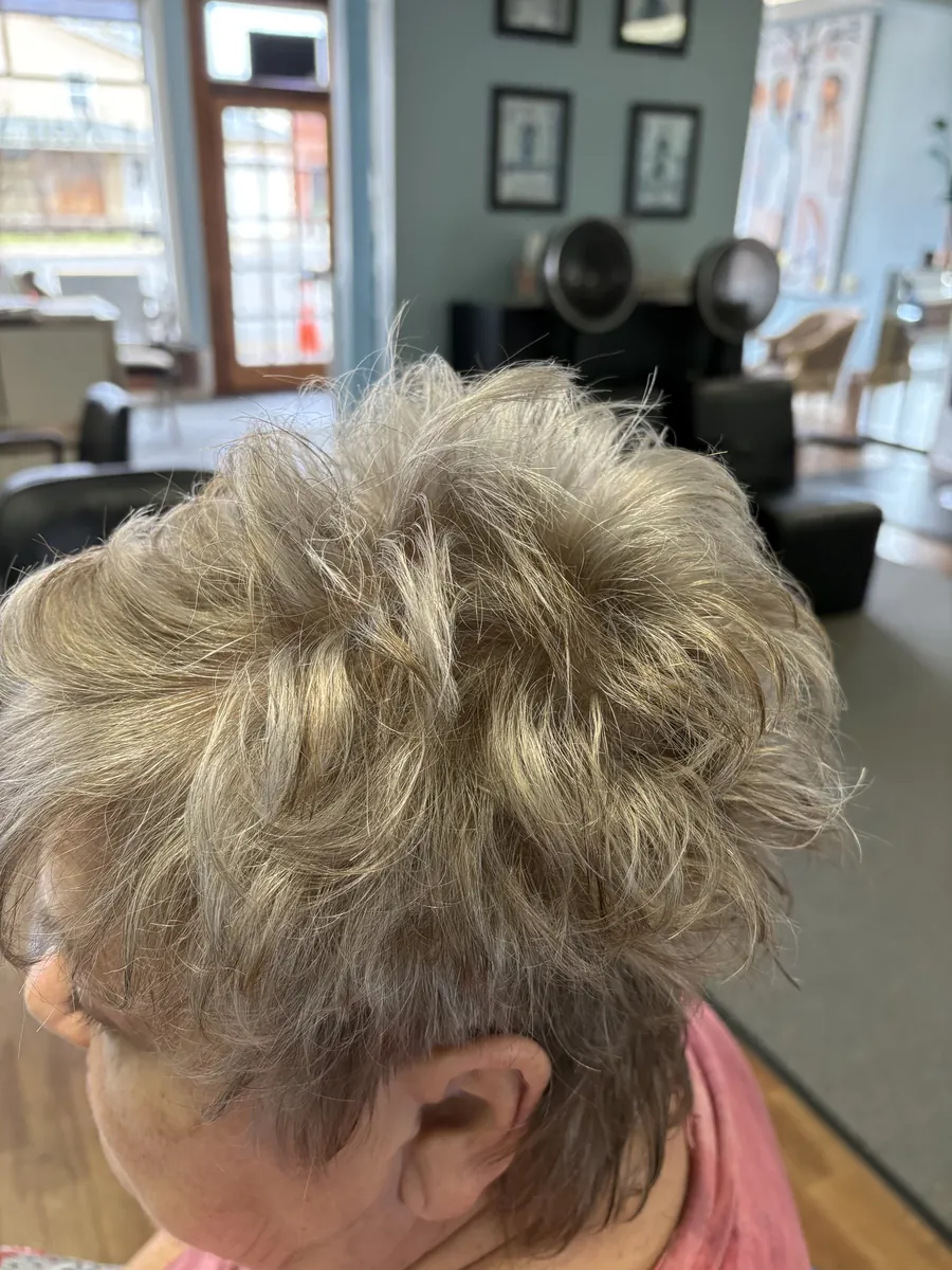 Textured, tousled blonde haircut