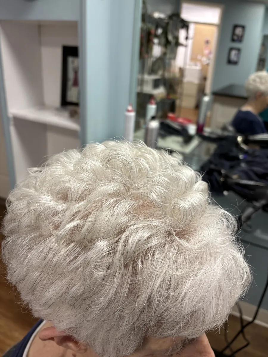 Voluminous silver curls, top view