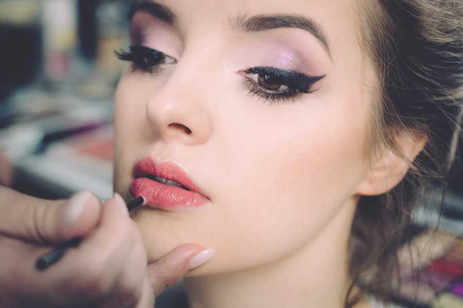 Close-up of bridal makeup application